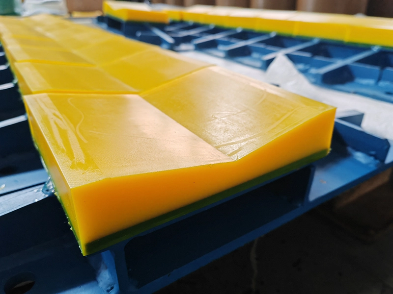 oil-resistant-interlocking-urethane-coil-saddles-for-metal-processing-slitting-lines