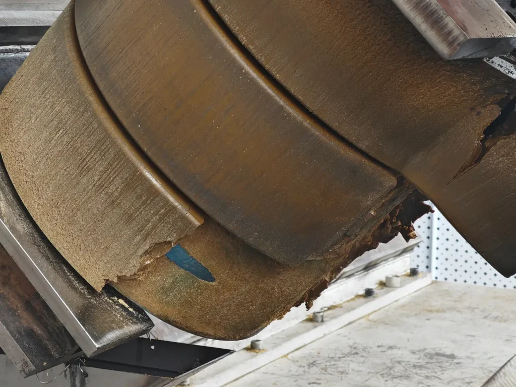 Polyurethane wheel delamination failure under heavy load